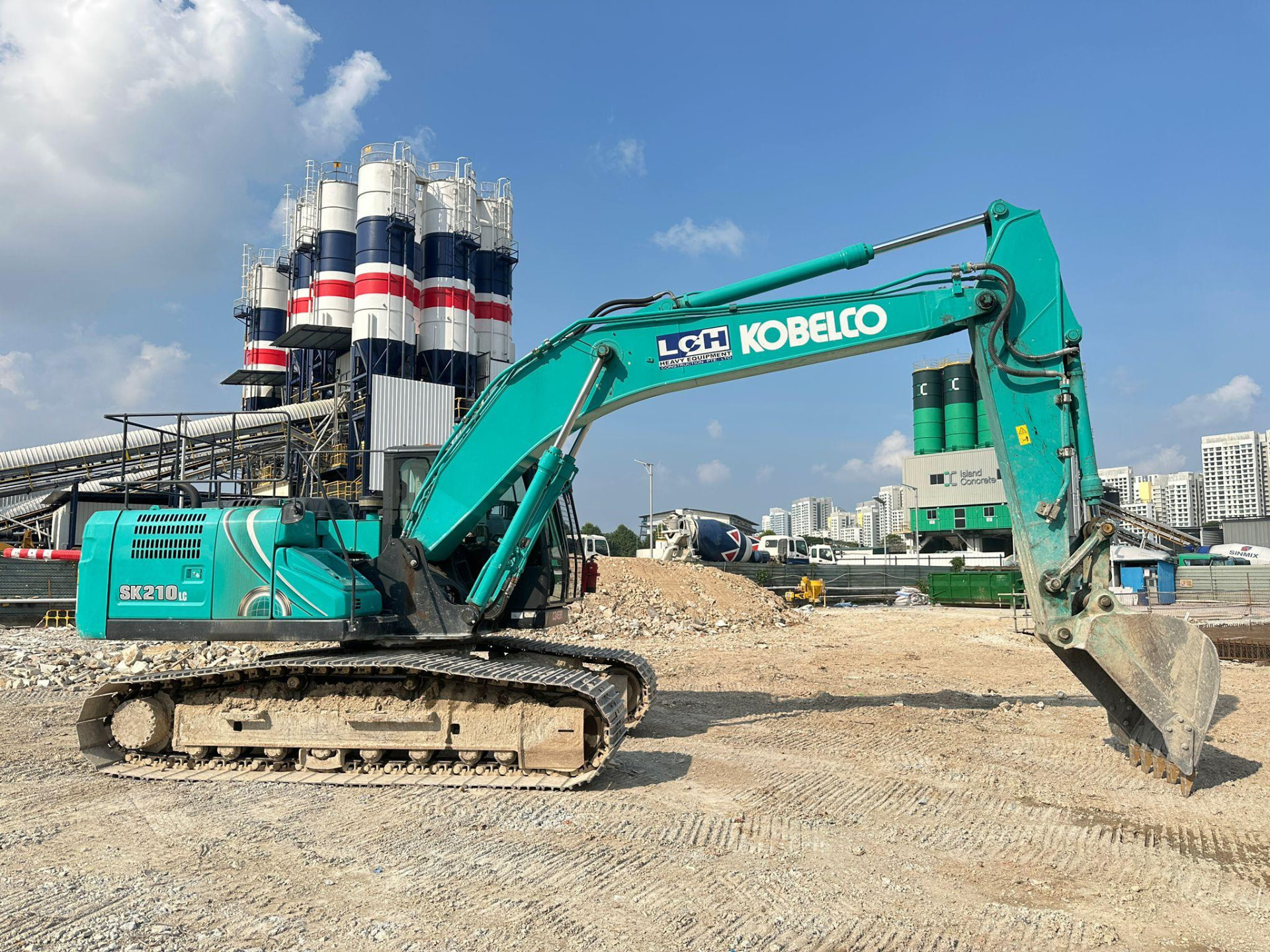 LCH hydraulic excavator working in an open trench on a Singapore construction site
